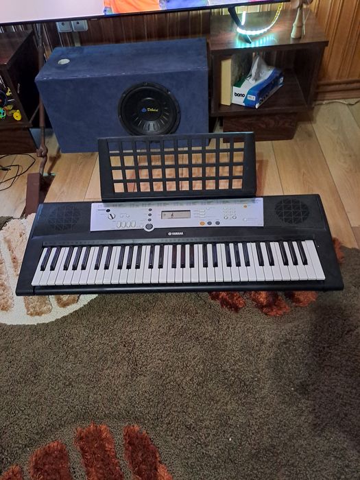 Ogra YAMAHA originala + incarcatorul de alimentare original