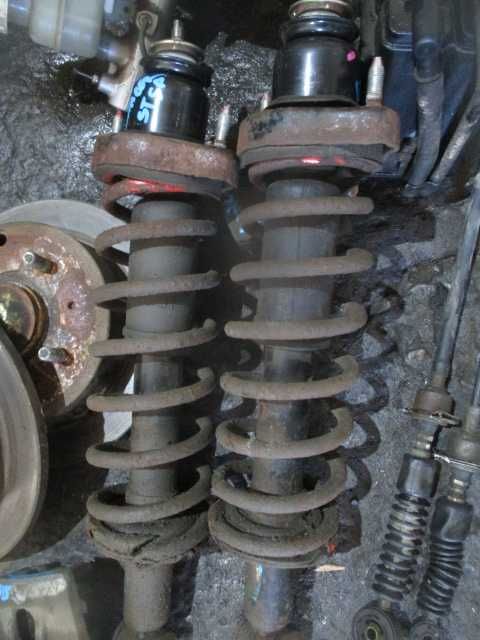 Amortizoare arcuri flanse spate MITSUBISHI LANCER an 2006 originale