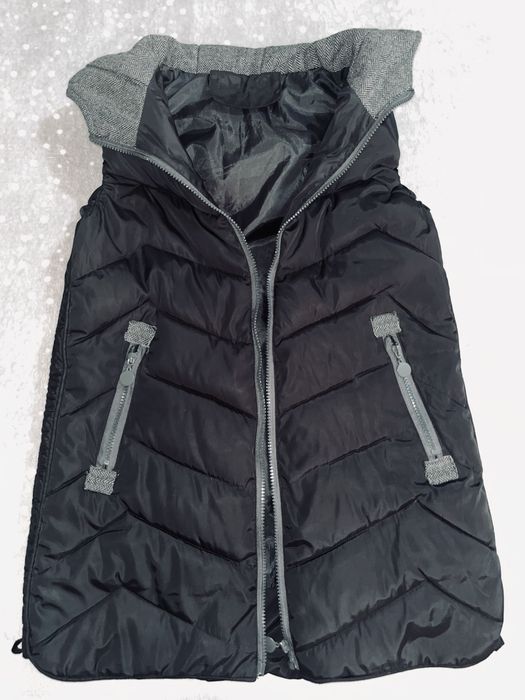 Безрукавка  новая 3500