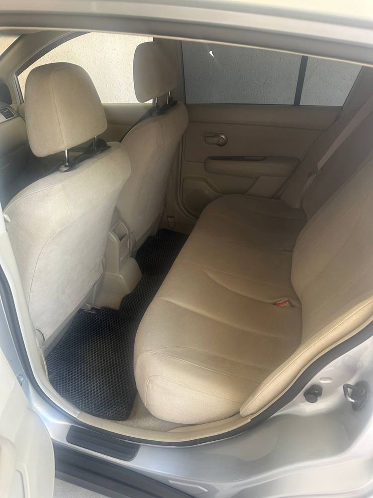 Nissan   Tiida 1,6