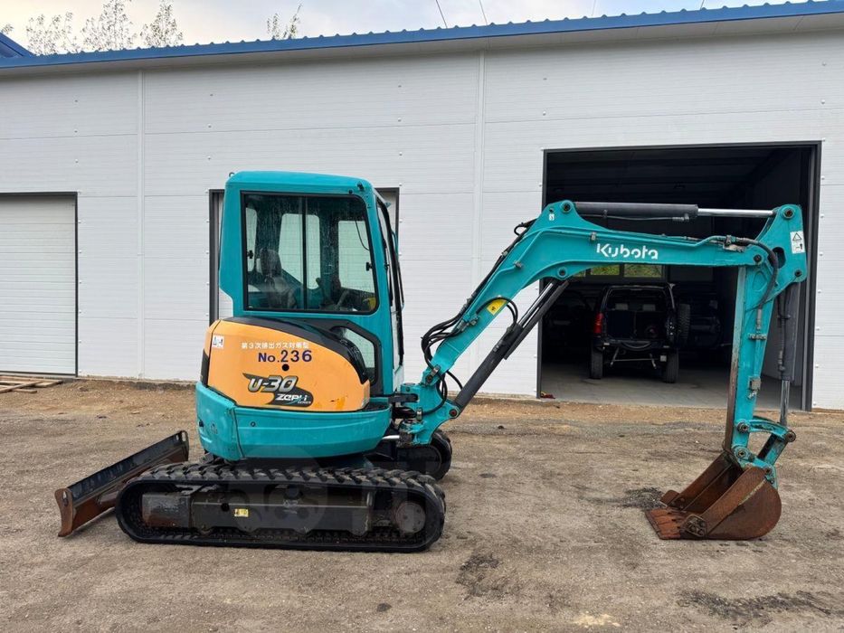 Мини экскаватор.