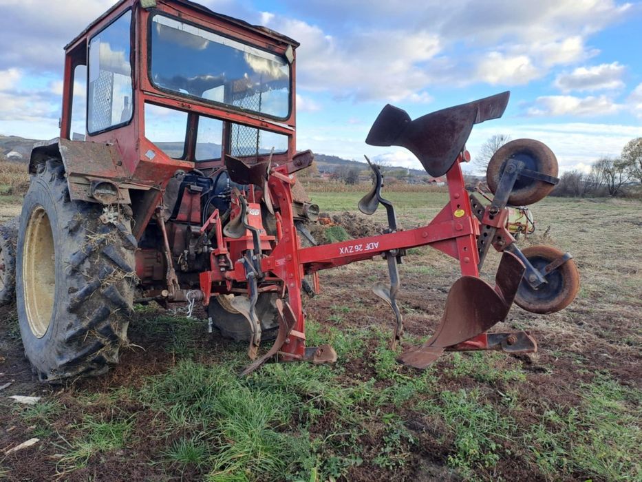 Plug reversibil doua brazde