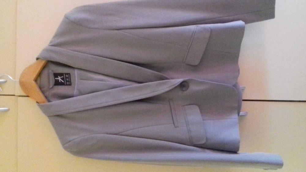 Елегантен дамски костюм на atmosphere пола със сако