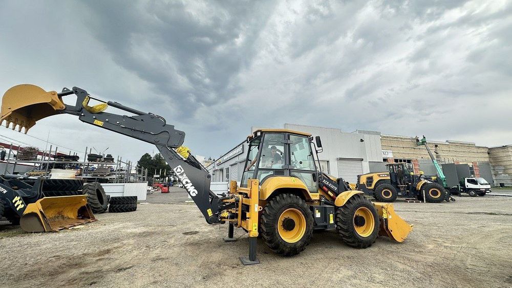 Экскаватор Погрузчик ХСМЖ