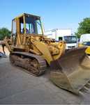vola pe senile , incarcator frontal , Caterpillar 953 cu scarificator