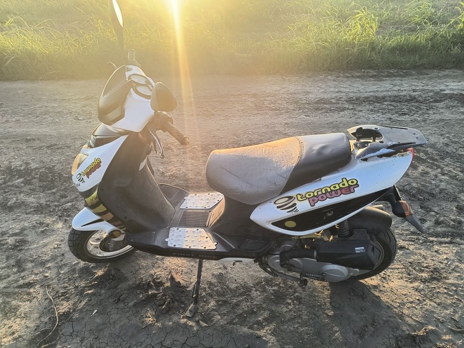 Vând scuter in 4 timpi și bicicleta copii