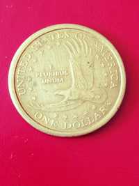 Moneda de 1 dolar din anul 2000.