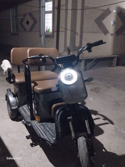 Электрический трицикл