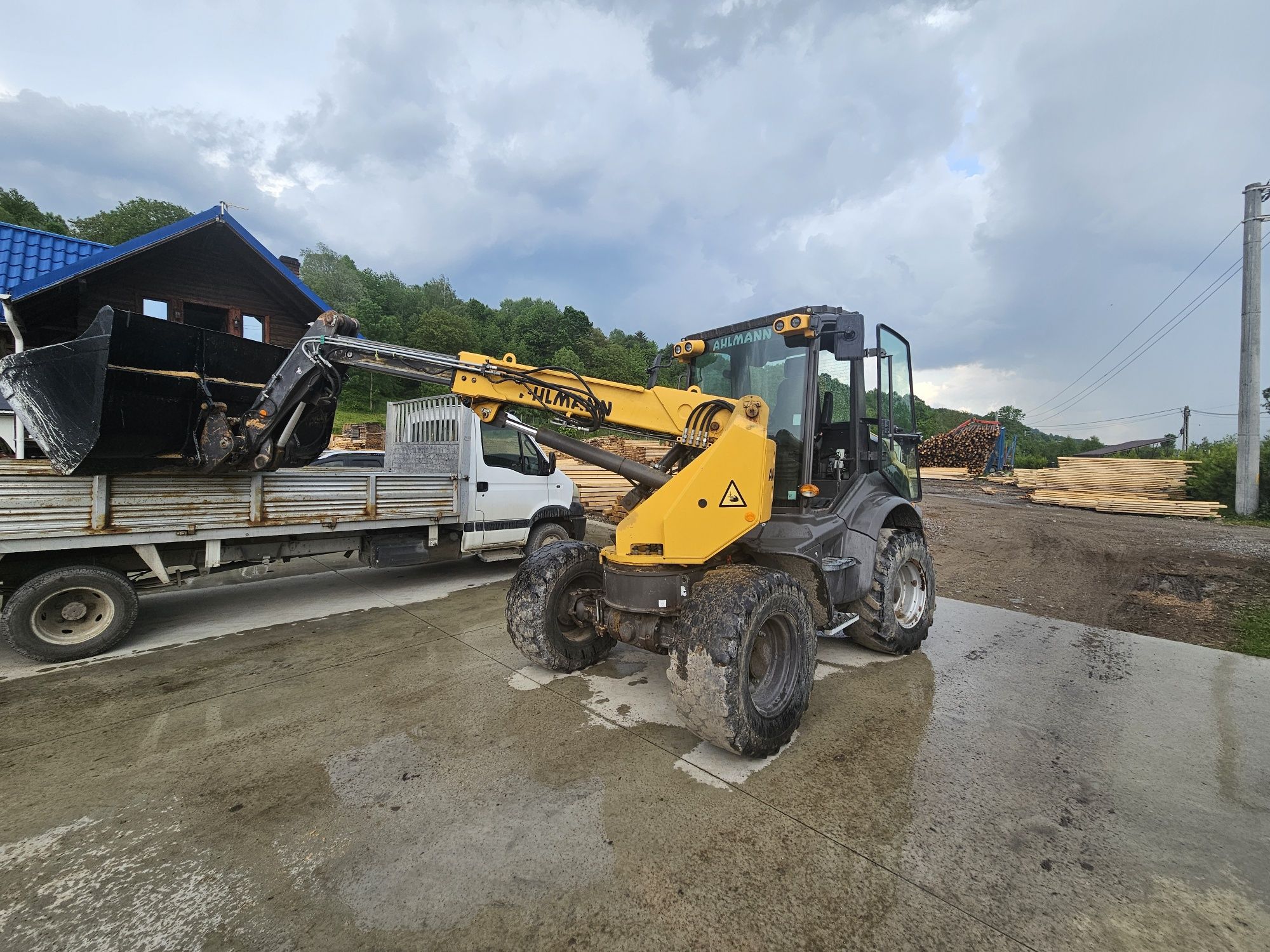 Încărcător frontal telescopic rotativ Ahlman Mecalac 900 Tele