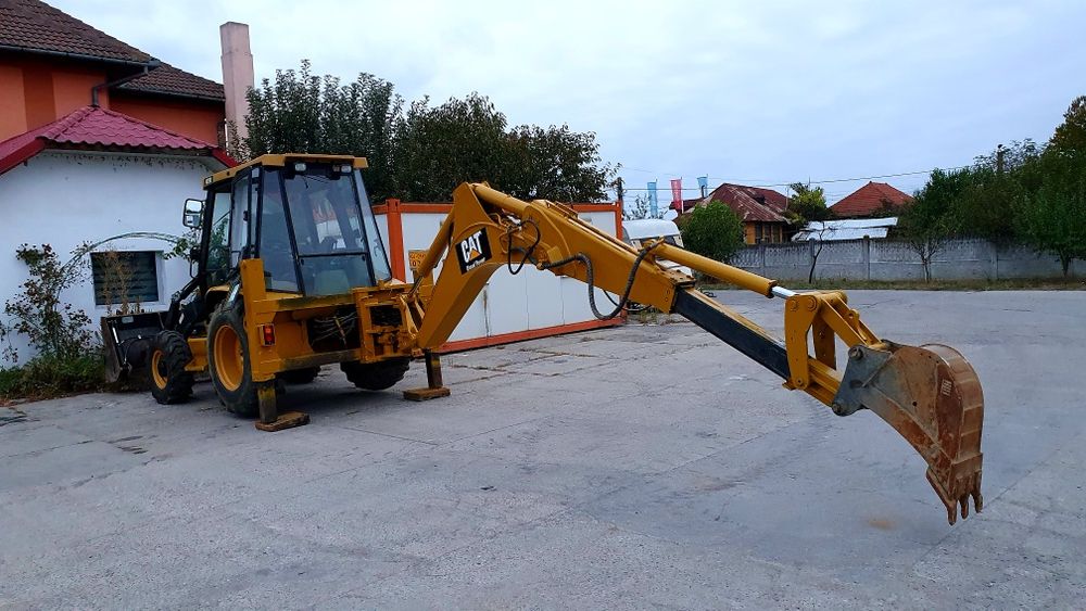 Buldoexcavator Caterpillar