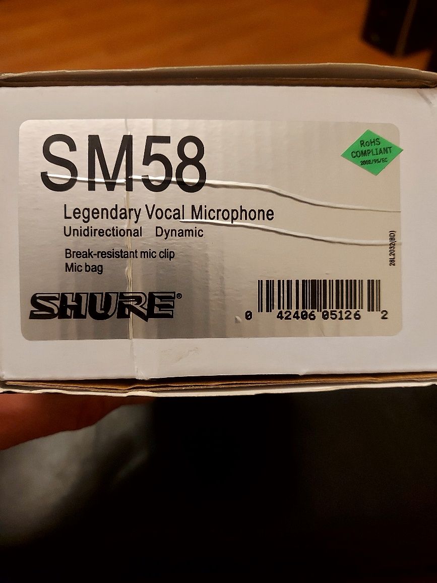 Музикален микрофон SHURE SM 58  за професионални певци и любители на м