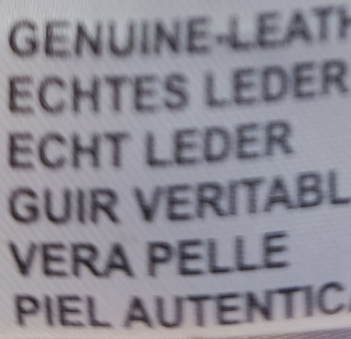 Кожух от естествен косъм и кожа.