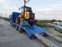 Tractari auto transport utilaje platformă utilaje asistentă rutieră