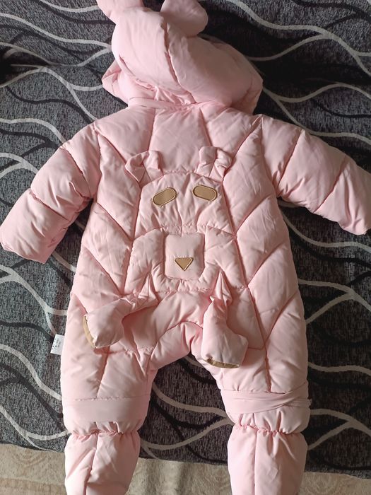 Продам обсолютно новый зимний комбинезон и новые детские сапожки