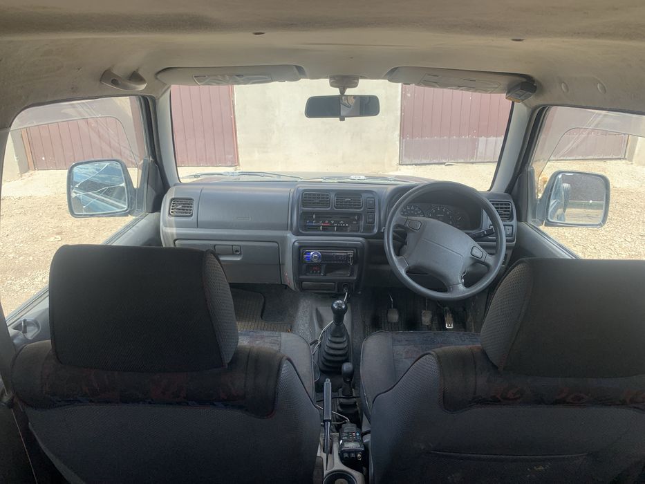 Suzuki jimny 99 volan dreapta