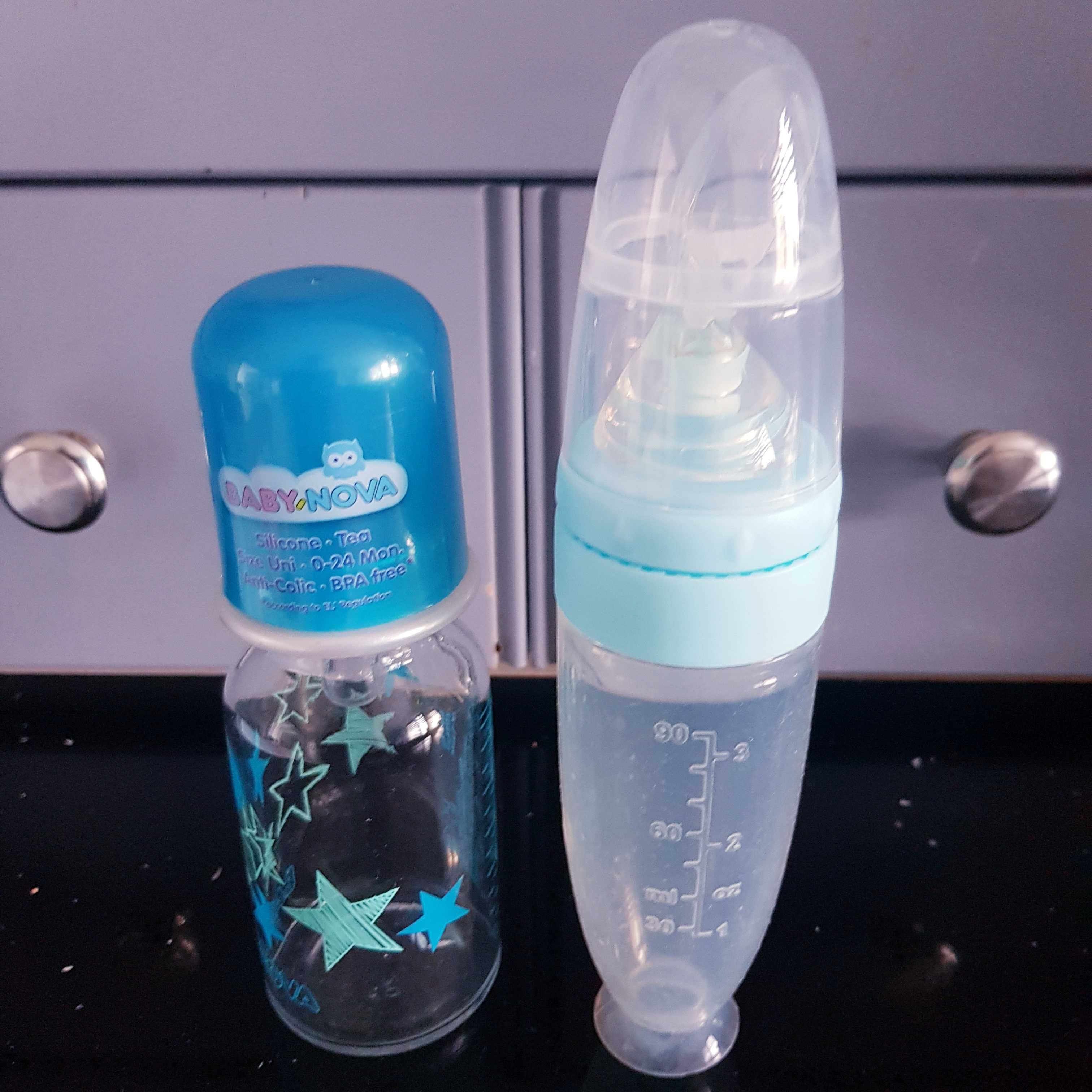 Lingurița din silicon cu rezervor si sticla pentru bebe