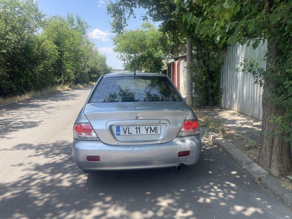 Vand sau schimb Mitubisi Lancer 1.6 benzina cu gpl