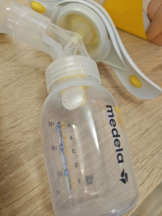 Ръчна помпа за кърма Medela + колектор за кърма Lansinoh