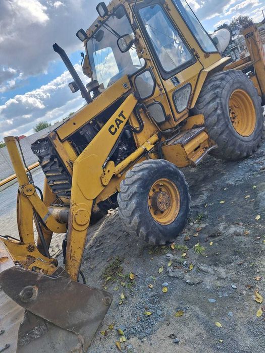 Buldoexcavator Caterpillar