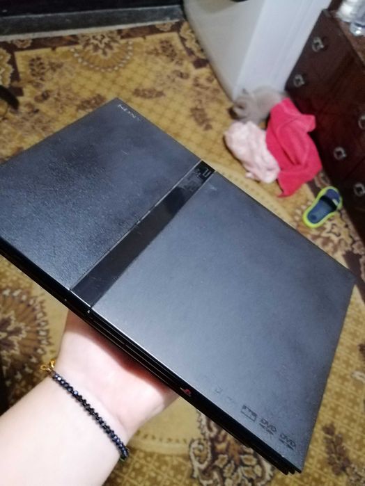 PS2 с един джойстик и 4 игри