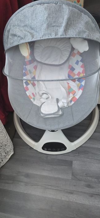 Leagan electric cu oscilatie stanga dreapta