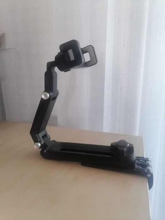 Suport auto pentru telefon cu prindere pe parasolar
