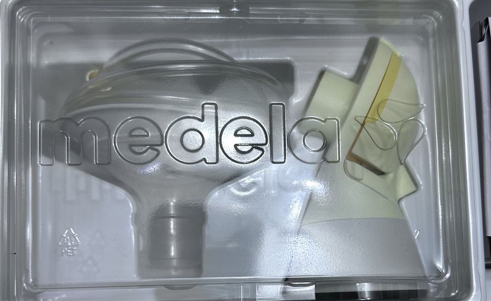 Молокоотсос Medela