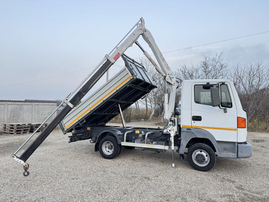 Nissan Atleon basculabil pe cutie cu macara de 1700 kg .