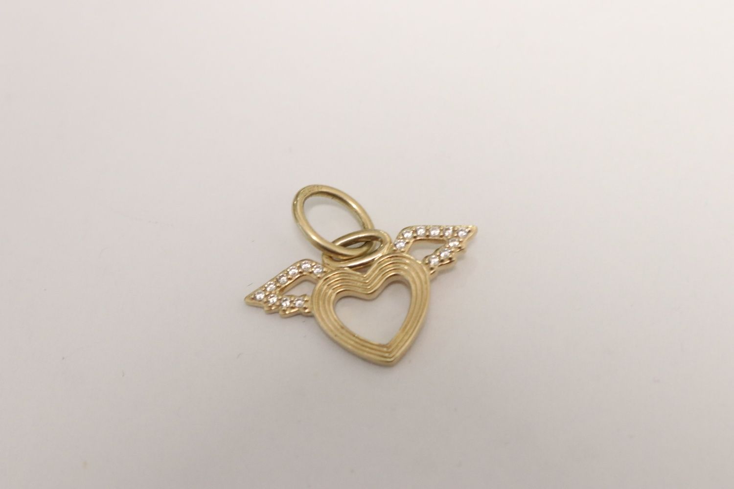 Vand pandantiv inimioara aur 14 k 1.47 g