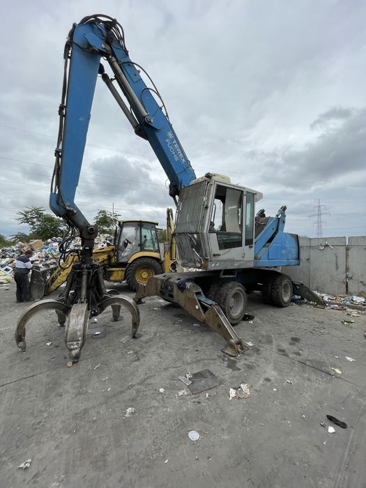 Fuchs MHL 320 excavator graifer - schimb auto/ teren