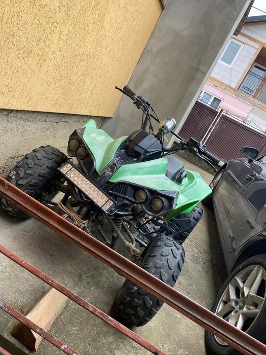 Vând atv 125 în 4 t