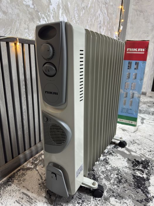 Масляный обогреватель Nikai — состояние как новый!