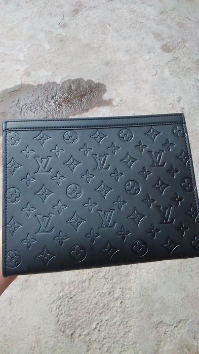 Louis Vuitton Pochette Voyage MM. Original