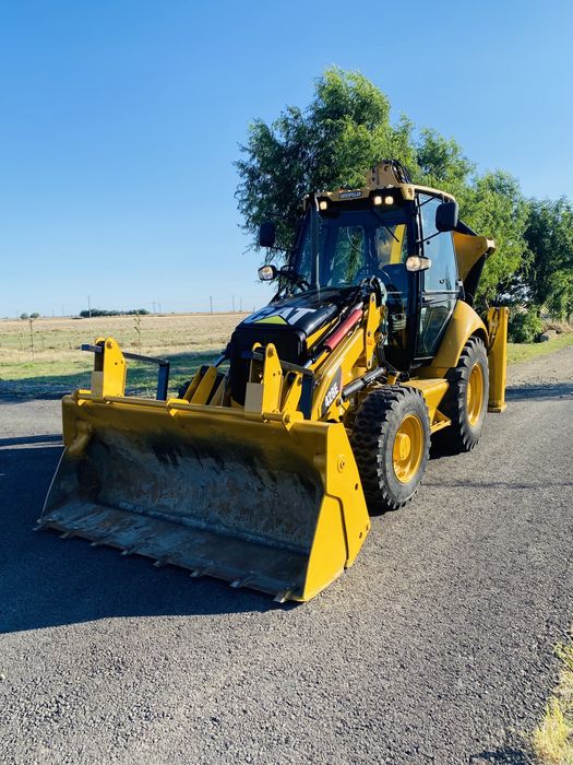 Buldoexcavator Cat 428E