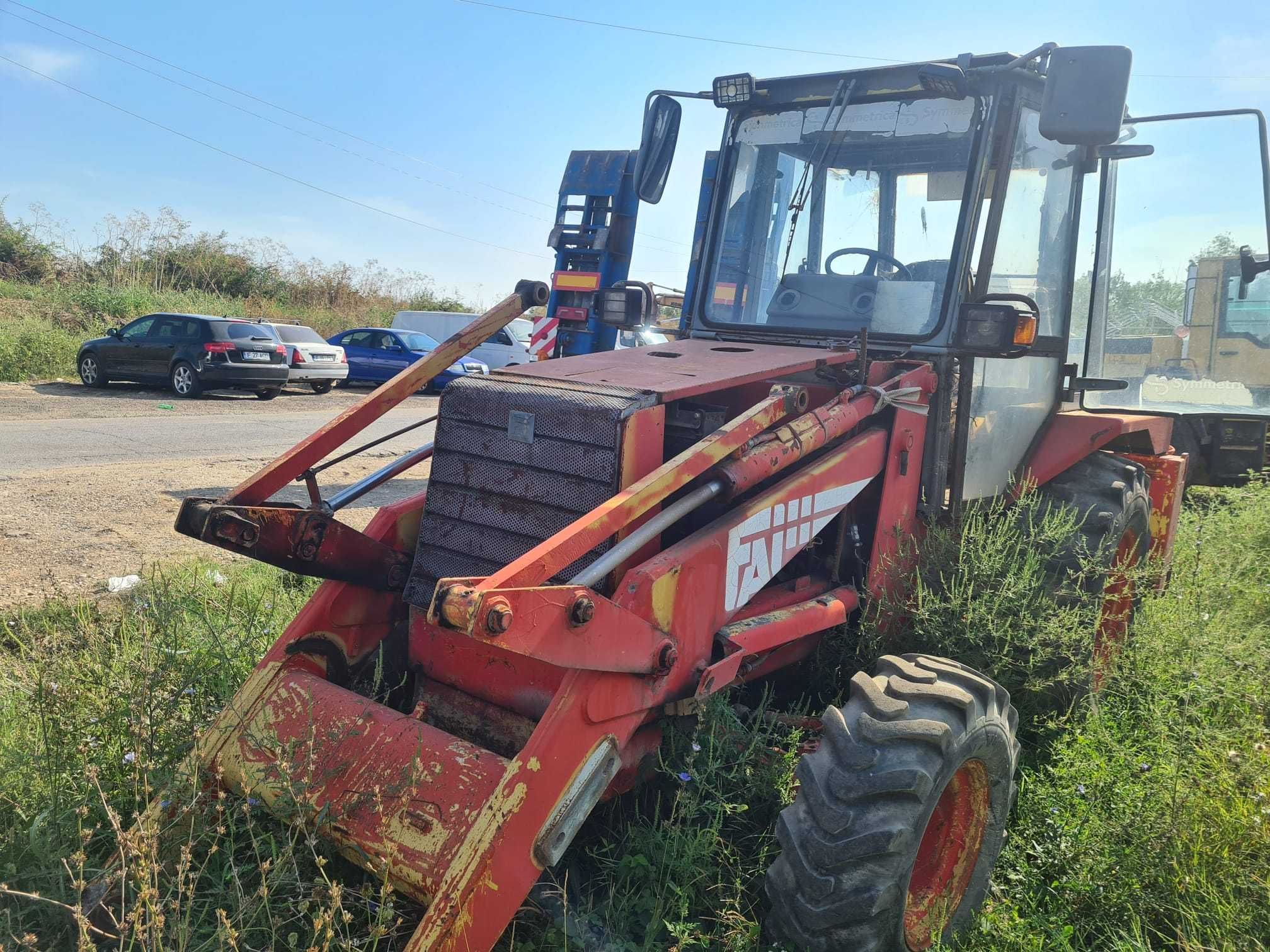 Dezmembrez buldoexcavator FAI Komatsu