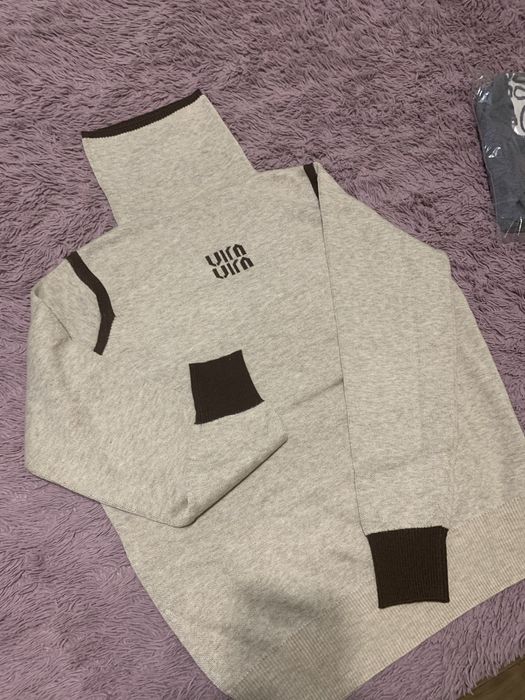 Свитер новый