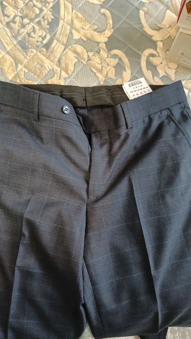 Продам костюм мужской фирмы GLASMAN .