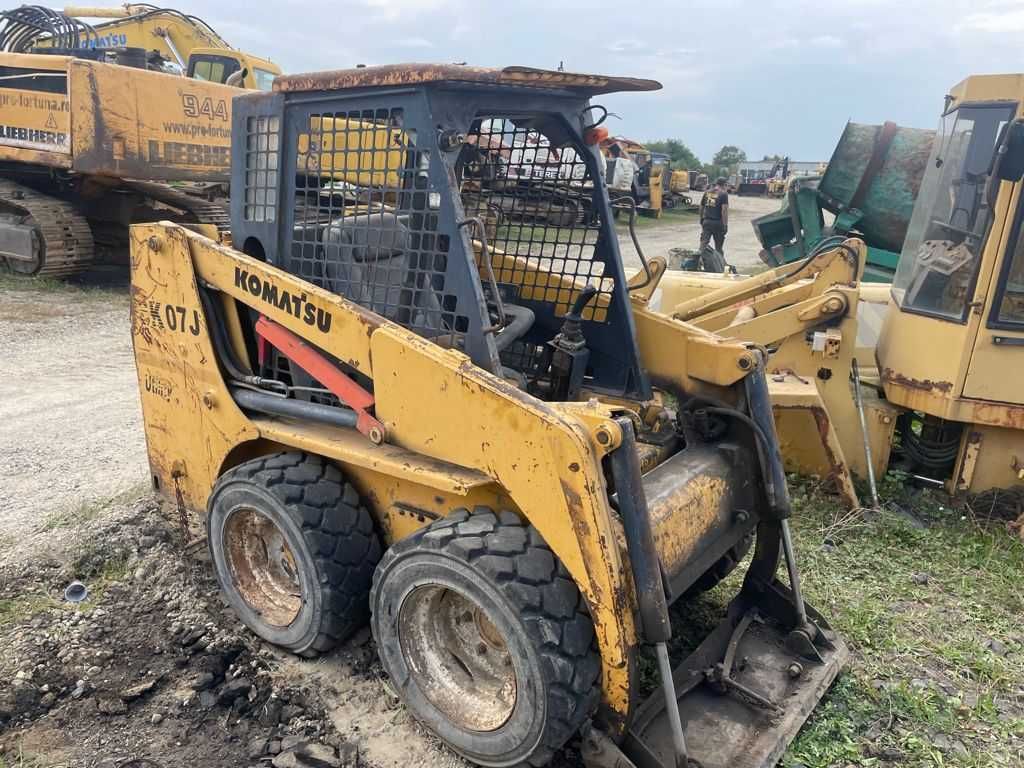 Dezmembrez bobcat Komatsu SK 07