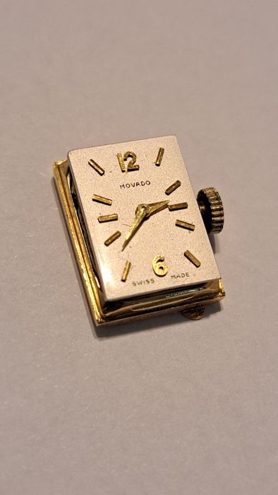 Mecanism plus capac de Aur 18 K Movado