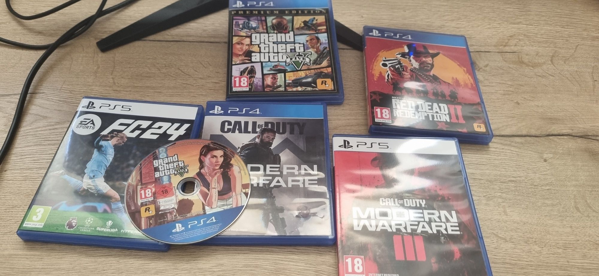 PlayStation 5 cu jocuri FIFA 24, GTA 5 și Redemption