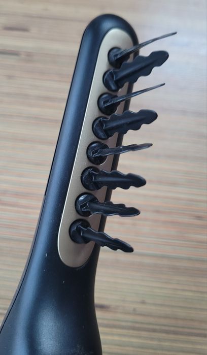 Perie electrică de descurcare a parului Remington