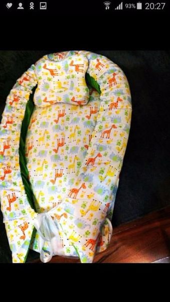 Подушка для удобного кормления новорожденного
