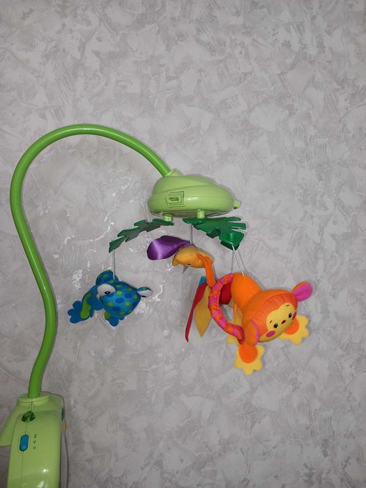 Музикалната въртележка на Fisher Price Rainforest Peek a Boo Leavesж