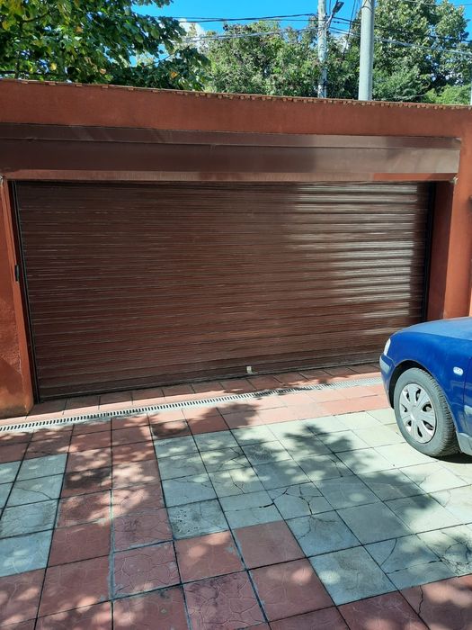 Reparații uși garaj