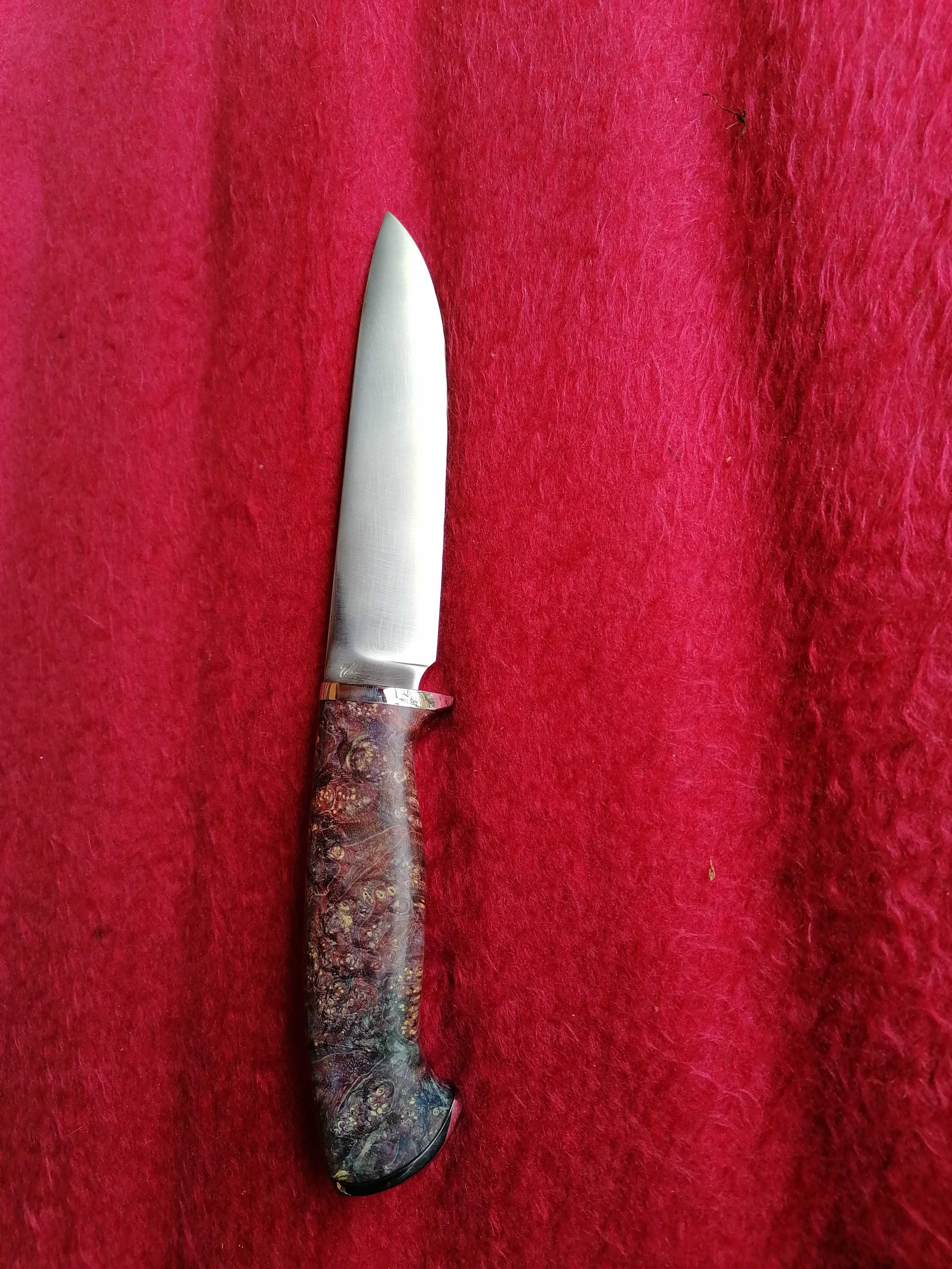 Нож от стомана s125v закален на 61единици.