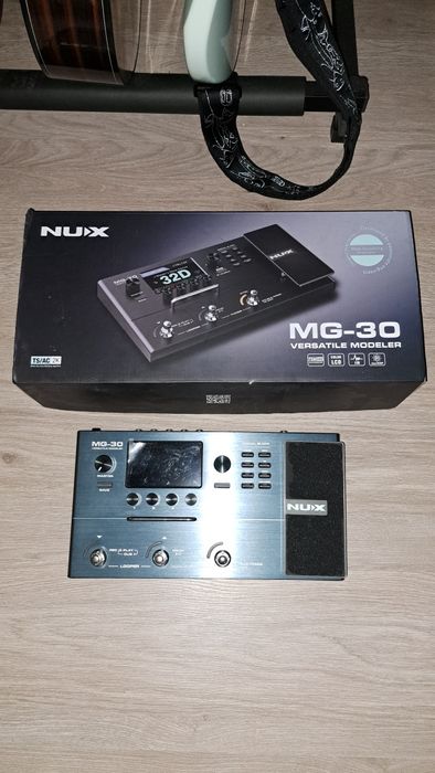 Продаю Nux MG-30.Все в коробке(футсвич,блок)Пользовался месяц.