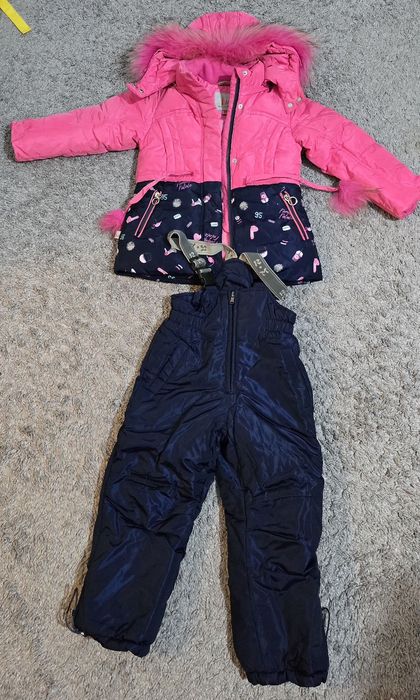 Продам детскую зимнию комбинезон. Для девочек