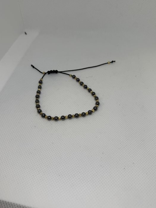 Гривна конец с позлатени топчета