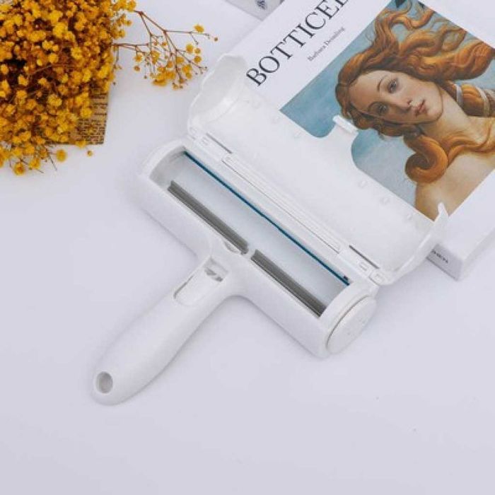 Четка за премахване на косми от домашни любимци