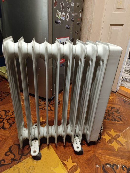 Продам масляный обогреватель батарею